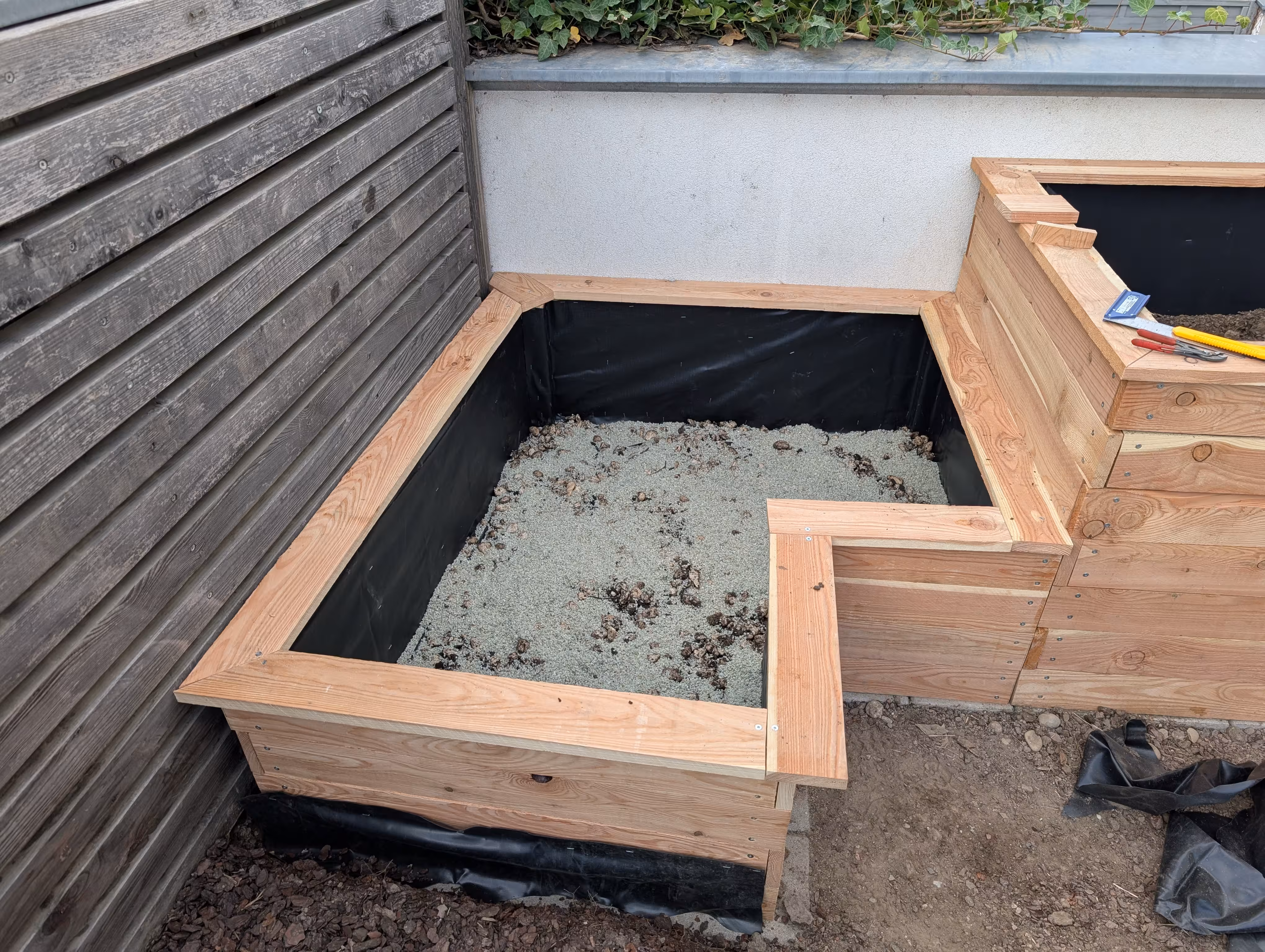 The small planter with the topper already attached and filled with gravel